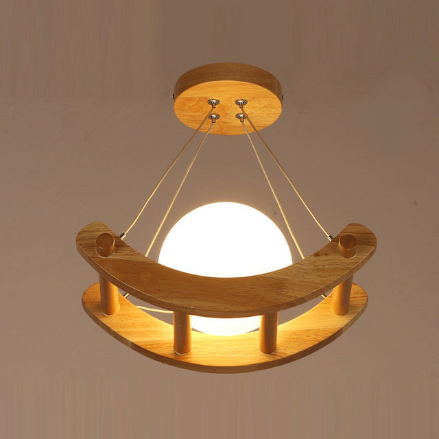 Wooden boat with glass moon pendant light