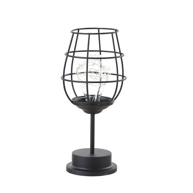 Iron bird cage bottles and goblet lights.